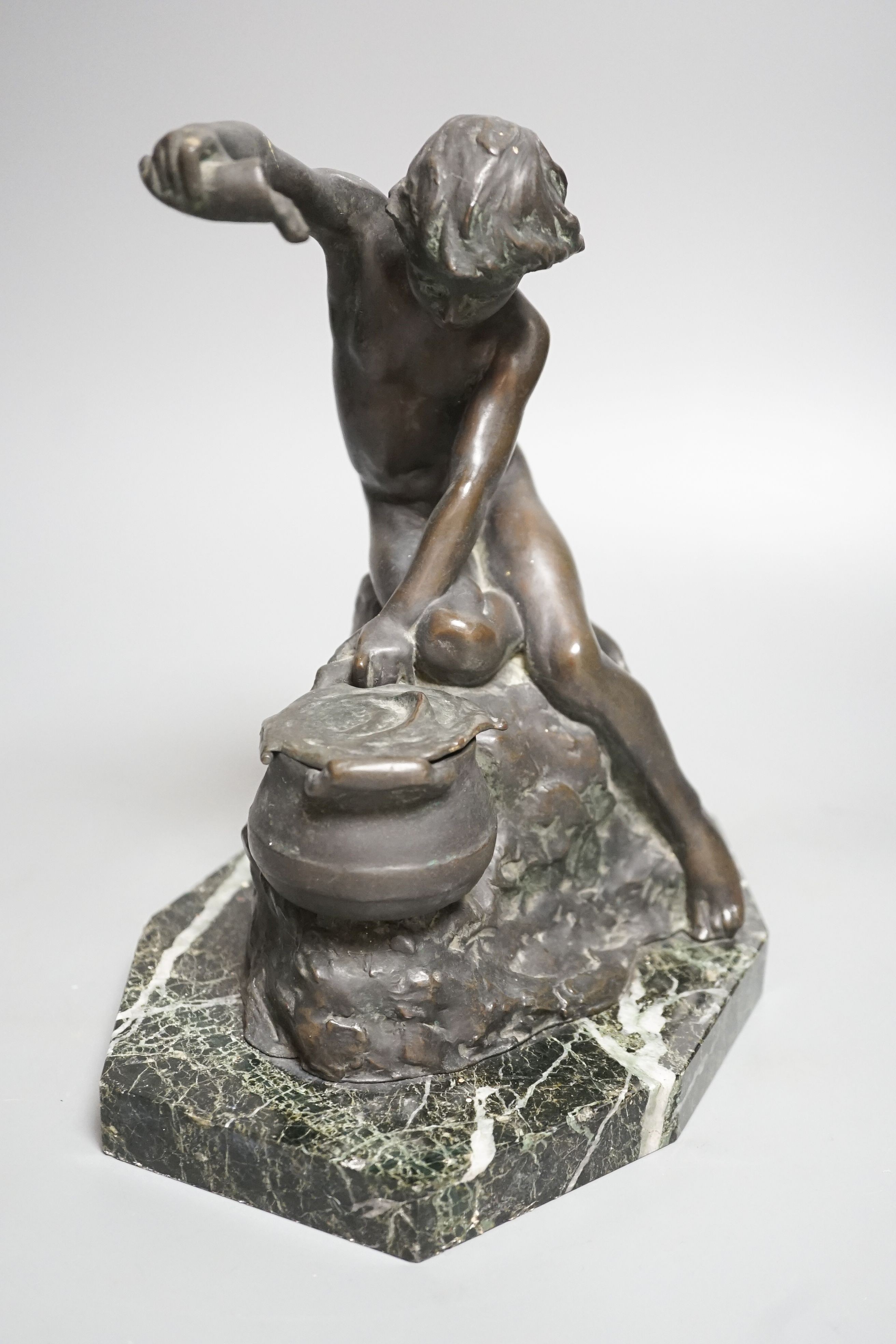 Lucy Gwendolen Williams (1870-1955). A bronze figure of a seated youth, green marble plinth, 24cm high